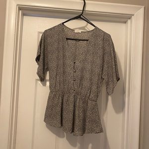 Sienna Sky size small cheetah print blouse